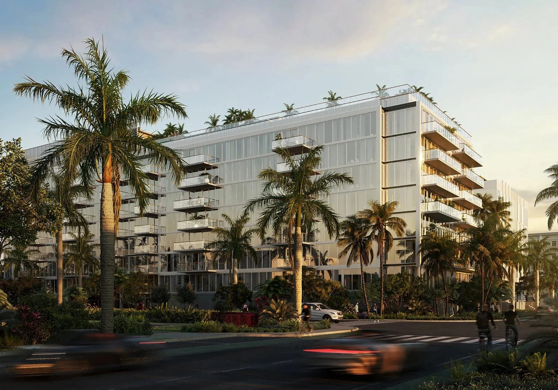 A waterfront building among palms in Bay Harbor Islands